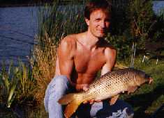 Kingfisher Willy in Amsterdam with a carp